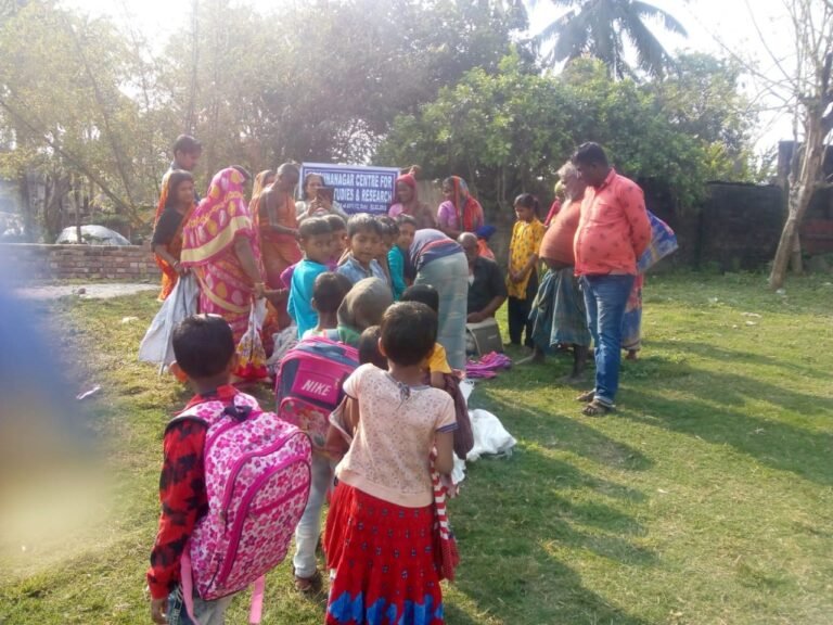 Clothes distribution to poor and needy at Dangna village of Bhimpur police station by Team KCSSR